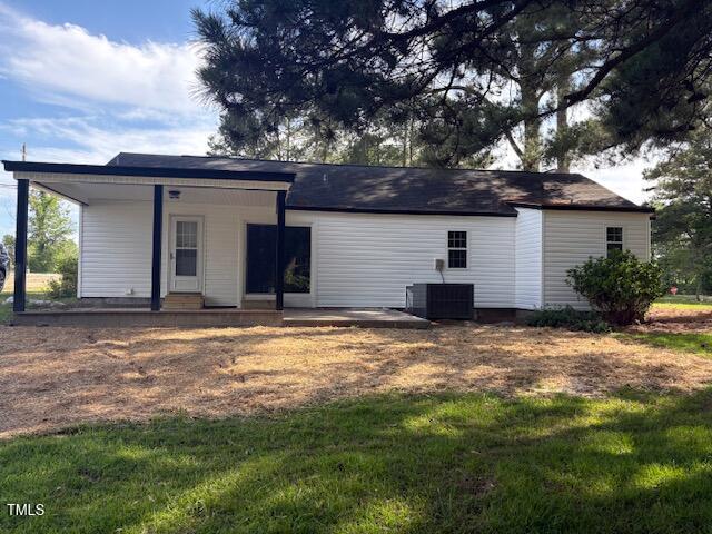 65 Prospect Church Rd, Erwin, NC 28339 - view of outbuilding featuring central air condition unit and a porch