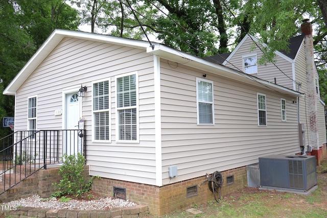 1536 Granville St, Burlington, NC 27215 - view of home's exterior with crawl space and central AC