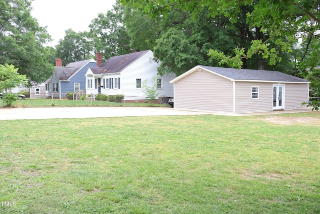 1536 Granville St, Burlington, NC 27215 - view of green lawn featuring an outbuilding