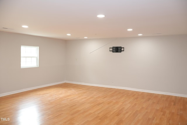 1536 Granville St, Burlington, NC 27215 - basement featuring light wood-style floors, recessed lighting, and baseboards