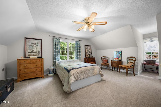 4 Barkridge Ct, Durham, NC 27713 - bedroom with vaulted ceiling, carpet flooring, a textured ceiling, ceiling fan, and baseboards