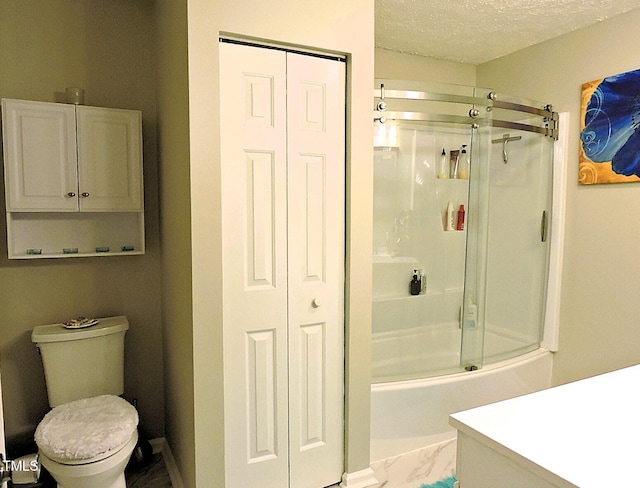 8 Woodsprite Ct, Durham, NC 27703 - bathroom featuring a closet, toilet, marble finish flooring, and vanity
