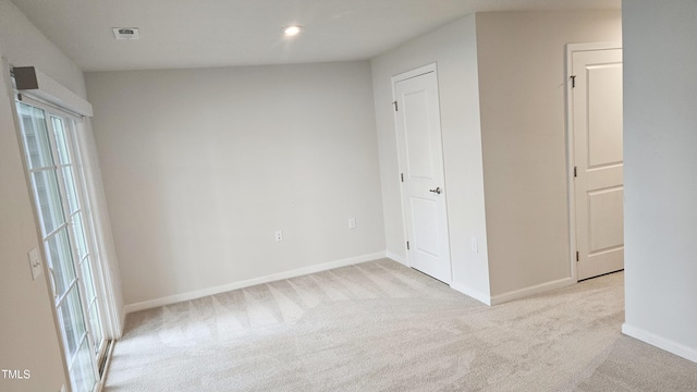 904 Romeria Dr, Durham, NC 27713 - spare room featuring carpet flooring and recessed lighting