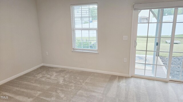 904 Romeria Dr, Durham, NC 27713 - carpeted empty room with baseboards