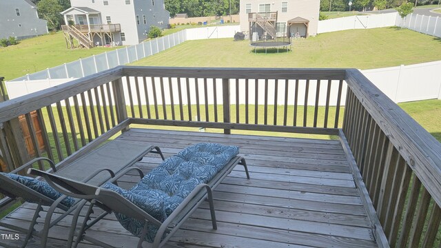 904 Romeria Dr, Durham, NC 27713 - deck with a trampoline, a fenced backyard, and a residential view