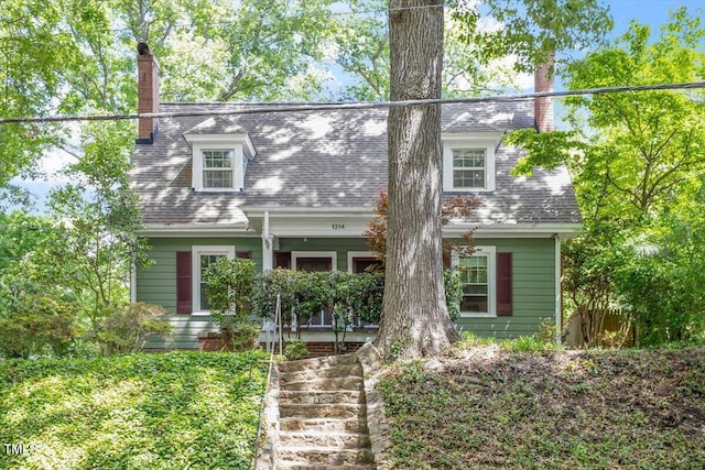 1314 Glendale Ave, Durham, NC 27701 - cape cod house with a chimney and covered porch