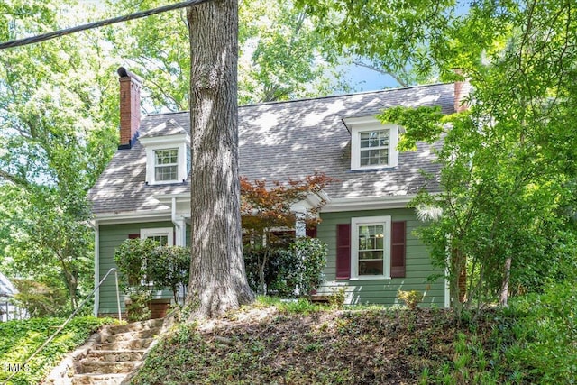 1314 Glendale Ave, Durham, NC 27701 - new england style home featuring a chimney and stairway