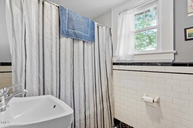 1314 Glendale Ave, Durham, NC 27701 - full bath with a sink, tile walls, and a shower with curtain