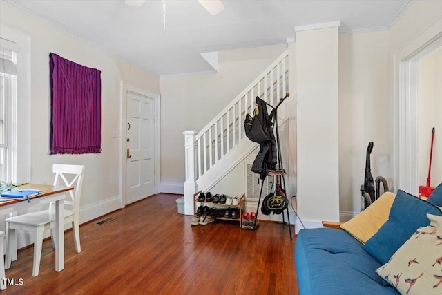 1314 Glendale Ave, Durham, NC 27701 - entryway featuring stairs, wood finished floors, baseboards, ornamental molding, and ceiling fan