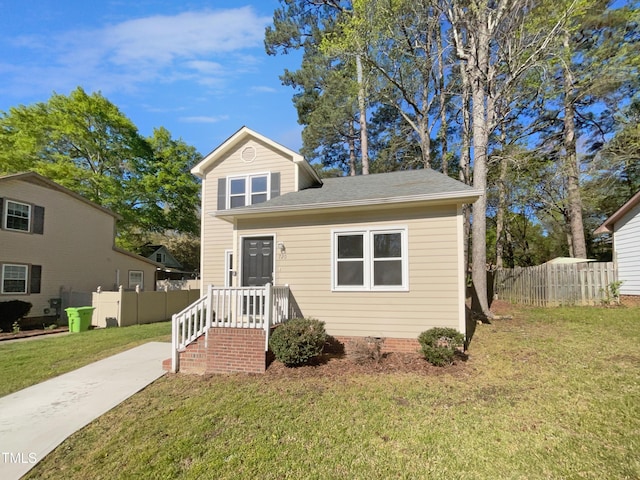 view of front of property with a shingled roof