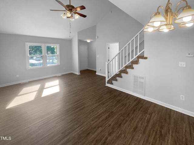unfurnished living room with ceiling fan, dark wood finished floors, a chandelier, stairs, and baseboards