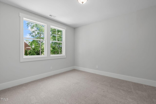 248 Ashford Dr, Pittsboro, NC 27312 - spare room featuring carpet floors and baseboards