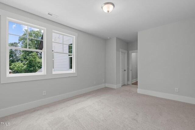 248 Ashford Dr, Pittsboro, NC 27312 - carpeted spare room with baseboards