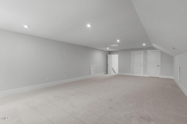 248 Ashford Dr, Pittsboro, NC 27312 - additional living space featuring recessed lighting, light carpet, baseboards, and lofted ceiling