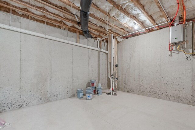 248 Ashford Dr, Pittsboro, NC 27312 - unfinished basement featuring water heater