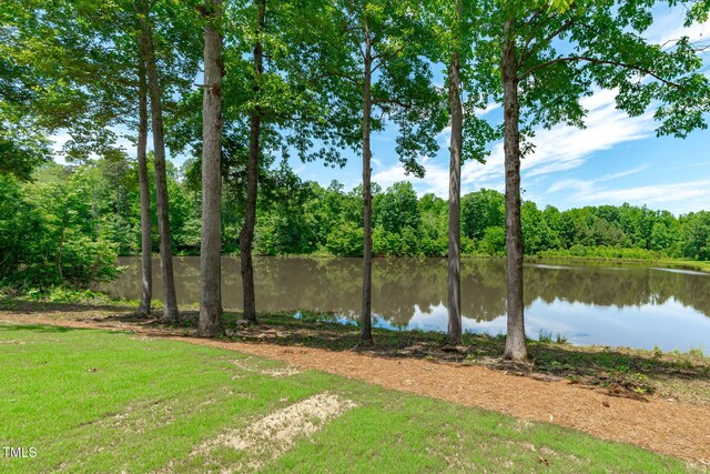 248 Ashford Dr, Pittsboro, NC 27312 - water view featuring a heavily wooded area