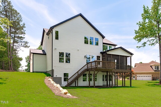 248 Ashford Dr, Pittsboro, NC 27312 - back of property featuring a sunroom, stairs, a lawn, and a deck