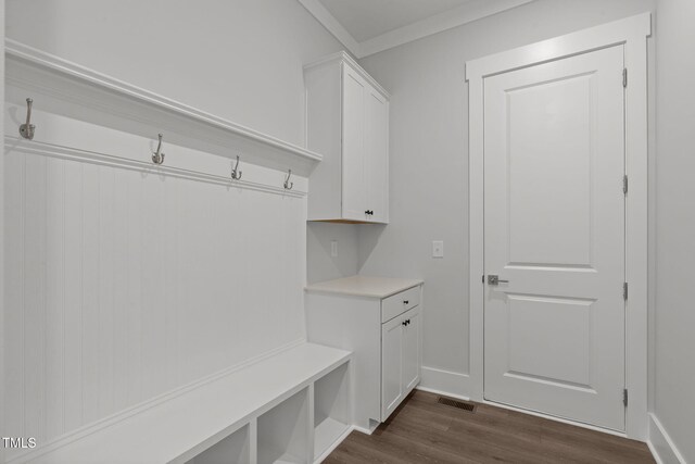 248 Ashford Dr, Pittsboro, NC 27312 - mudroom featuring dark wood-style flooring, ornamental molding, and baseboards
