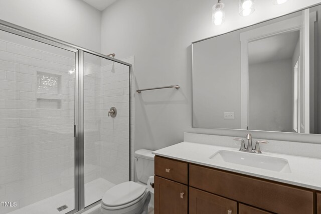 248 Ashford Dr, Pittsboro, NC 27312 - bathroom with toilet, a shower stall, and vanity