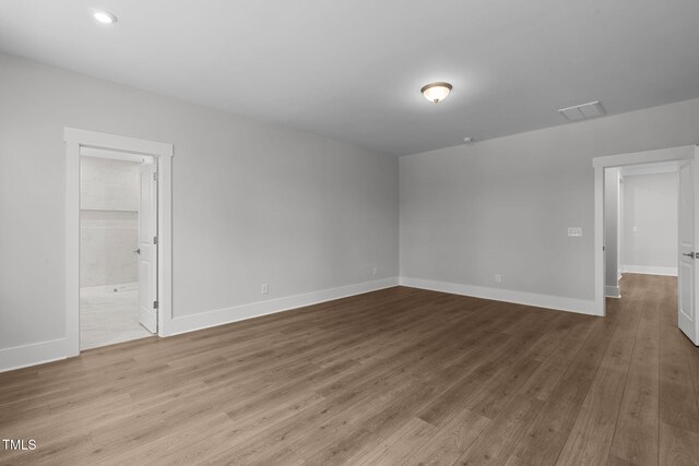 248 Ashford Dr, Pittsboro, NC 27312 - empty room featuring wood finished floors, baseboards, and recessed lighting