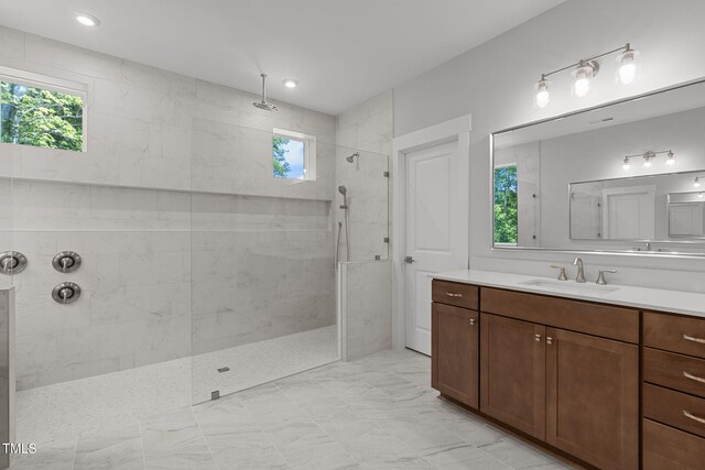248 Ashford Dr, Pittsboro, NC 27312 - full bathroom with healthy amount of natural light, walk in shower, vanity, and recessed lighting