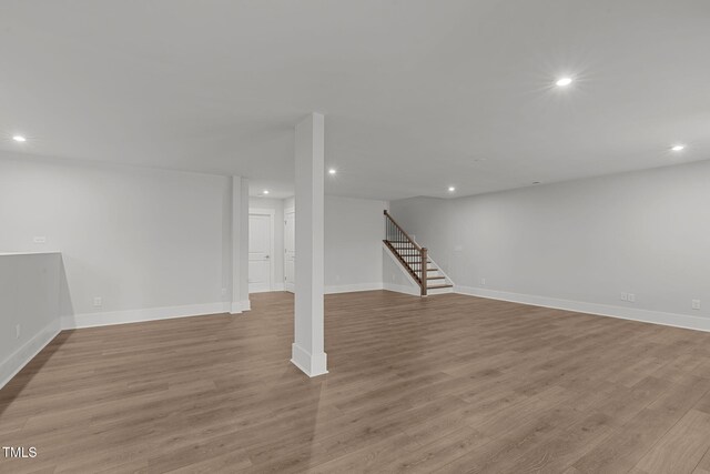 248 Ashford Dr, Pittsboro, NC 27312 - finished basement featuring recessed lighting, stairs, baseboards, and light wood-style flooring