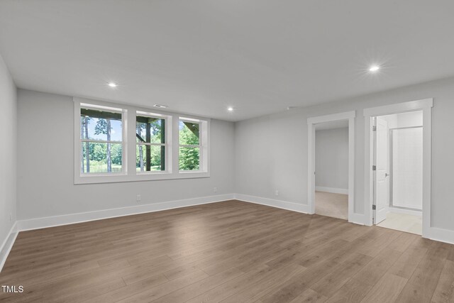 248 Ashford Dr, Pittsboro, NC 27312 - unfurnished room featuring wood finished floors, recessed lighting, and baseboards