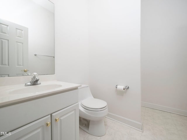11221 Paddy Hollow Ln, Raleigh, NC 27614 - half bath featuring vanity, toilet, and baseboards