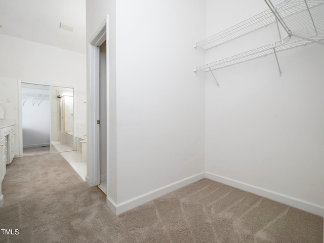 11221 Paddy Hollow Ln, Raleigh, NC 27614 - walk in closet featuring light carpet