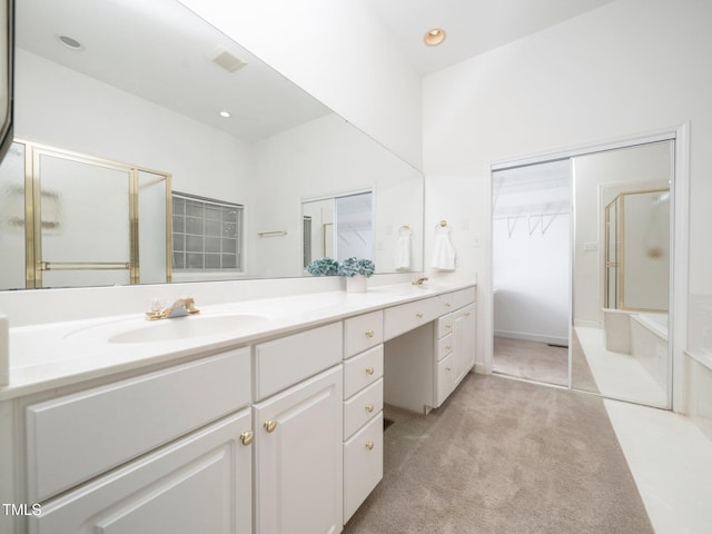 11221 Paddy Hollow Ln, Raleigh, NC 27614 - bathroom featuring a stall shower, vanity, and recessed lighting