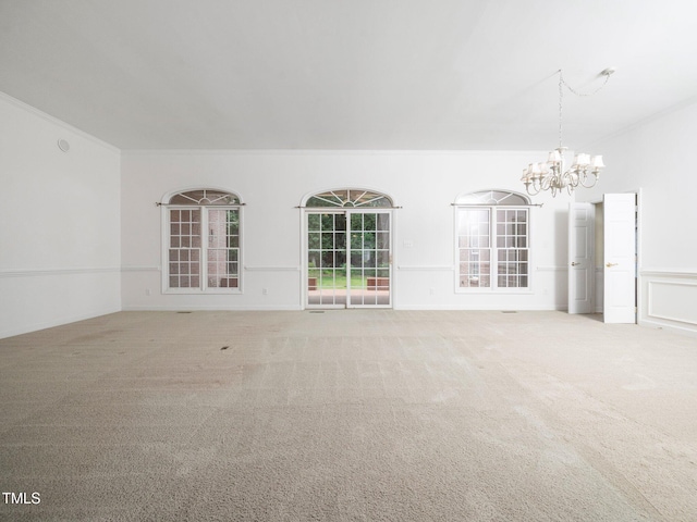 11221 Paddy Hollow Ln, Raleigh, NC 27614 - carpeted spare room with a chandelier and crown molding