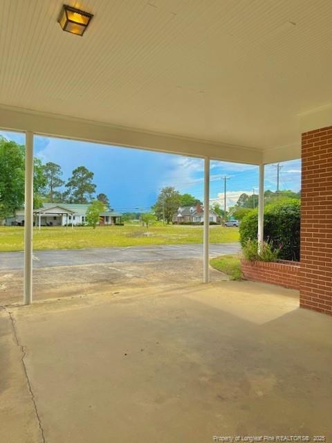 209 S Main St, Salemburg, NC 28385 - view of patio with a carport