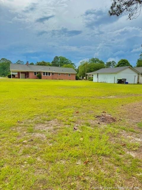 209 S Main St, Salemburg, NC 28385 - view of grassy yard