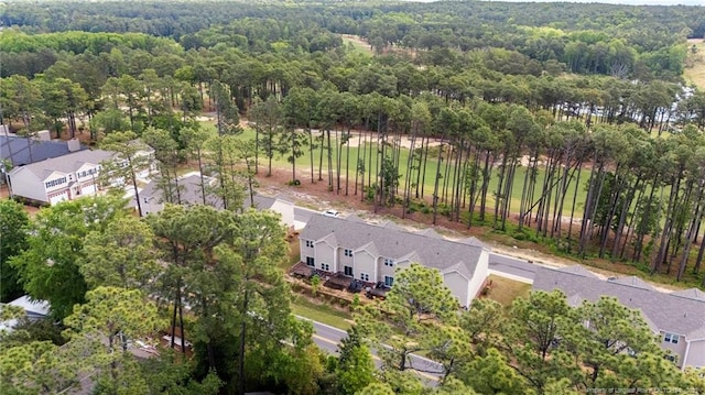 aerial view of residential area with a forest