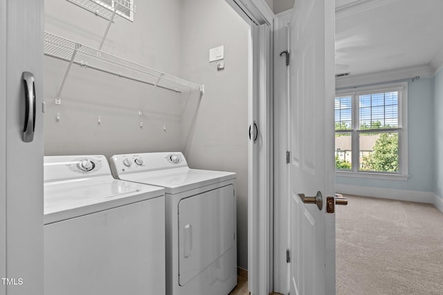 735 Portstewart Dr, Cary, NC 27519 - laundry room with washing machine and clothes dryer, carpet flooring, ornamental molding, and baseboards