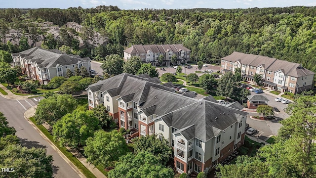 735 Portstewart Dr, Cary, NC 27519 - aerial perspective of suburban area with a forest