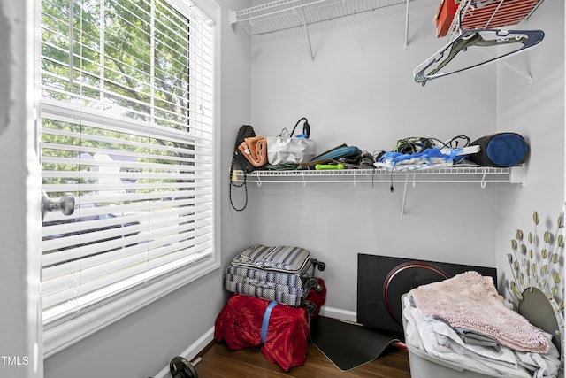 spacious closet with wood finished floors