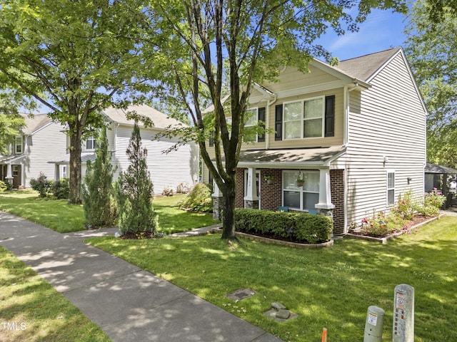 view of front of home with a front yard