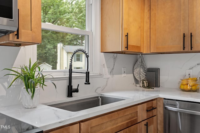 3700 Summer Pl, Raleigh, NC 27604 - kitchen with stainless steel appliances, a sink, brown cabinets, light stone counters, and decorative backsplash