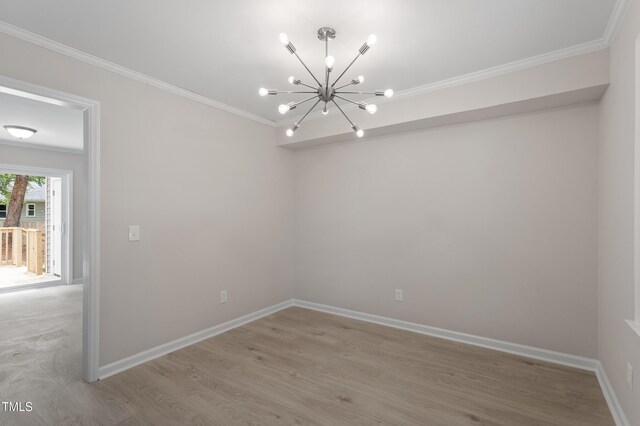 3700 Summer Pl, Raleigh, NC 27604 - unfurnished room with a chandelier, crown molding, light wood-style floors, and baseboards