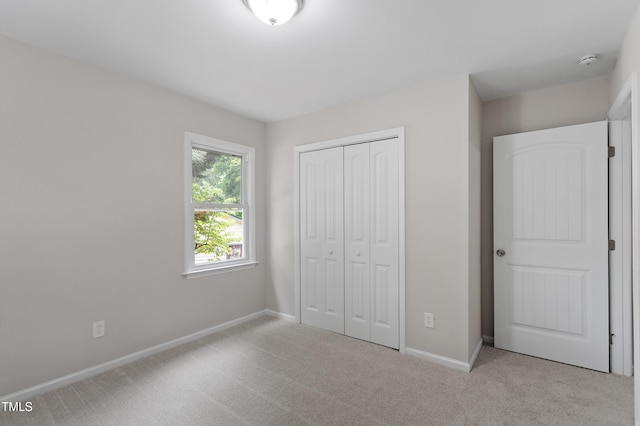 3700 Summer Pl, Raleigh, NC 27604 - unfurnished bedroom with carpet, a closet, and baseboards