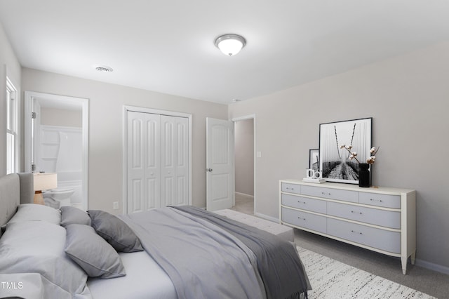 3700 Summer Pl, Raleigh, NC 27604 - bedroom with light carpet, a closet, baseboards, and connected bathroom