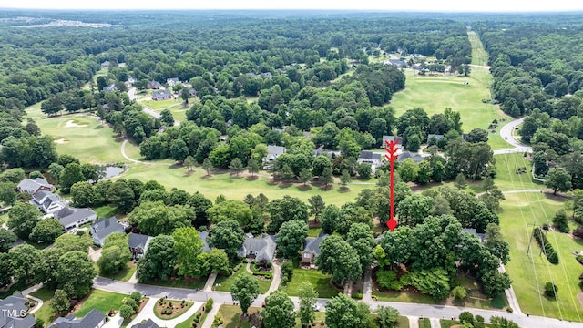 204 Muirfield Ln, Clayton, NC 27527 - aerial perspective of suburban area with a local golf course and a heavily wooded area