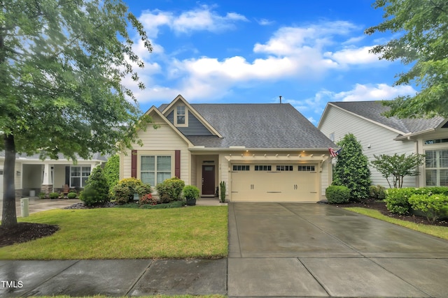 79 Heatherwood Dr, Chapel Hill, NC 27516 - craftsman-style house with an attached garage, driveway, a front yard, and a shingled roof