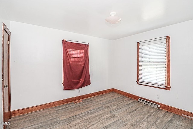 3301 Amherst Rd, Rocky Mount, NC 27804 - empty room with wood finished floors and baseboards