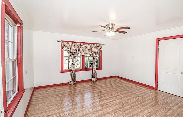 3301 Amherst Rd, Rocky Mount, NC 27804 - empty room with light wood finished floors, a ceiling fan, and baseboards