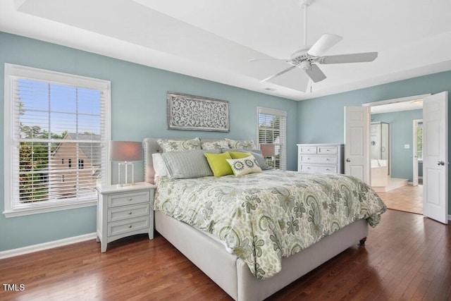 100 Wentbridge Rd, Cary, NC 27519 - bedroom with baseboards, wood finished floors, and ceiling fan