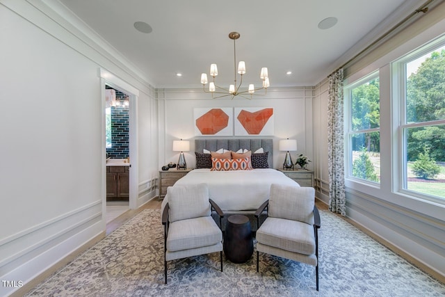 bedroom featuring crown molding, a chandelier, multiple windows, baseboards, and connected bathroom