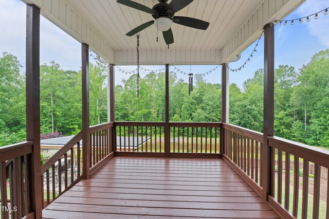 55 Prospectus Ln, Franklinton, NC 27525 - deck with a ceiling fan and a wooded view