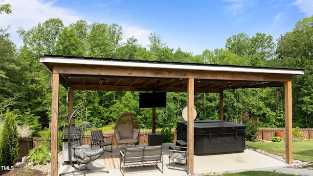 55 Prospectus Ln, Franklinton, NC 27525 - view of patio / terrace with fence and a hot tub